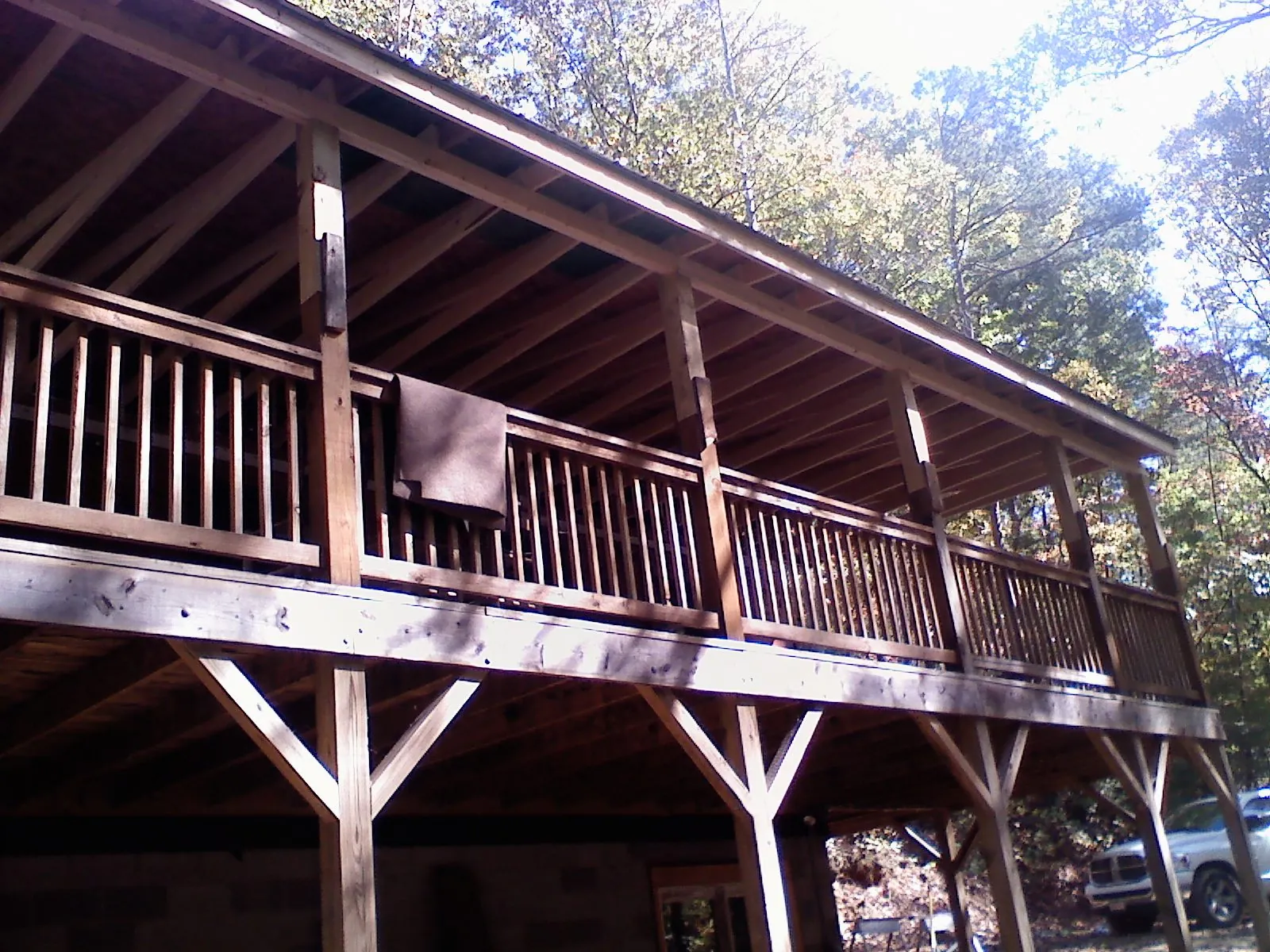Timber framing under a new elevated porch and deck — Roof Leak Repair in Marble Falls by Roofing Brothers